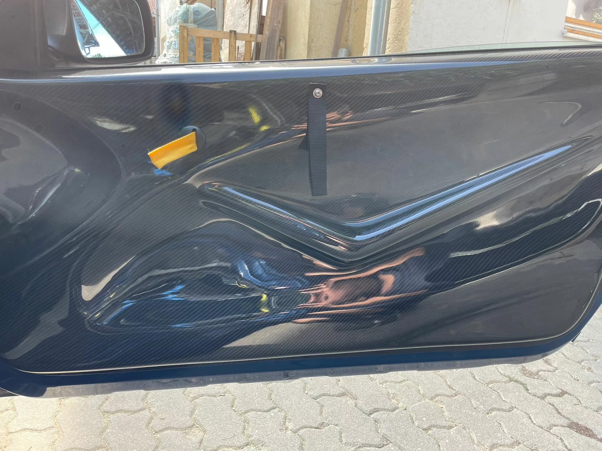 Sichtcarbon Türverkleidung BMW E46 M3 – Detailansicht Griffmulde und Zugschlaufe