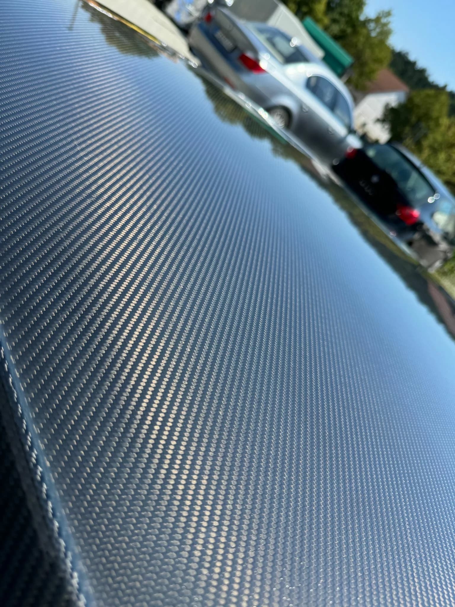 Detailaufnahme Carbon-Dach BMW E36 mit sichtbarer Carbonstruktur und Glanzfinish