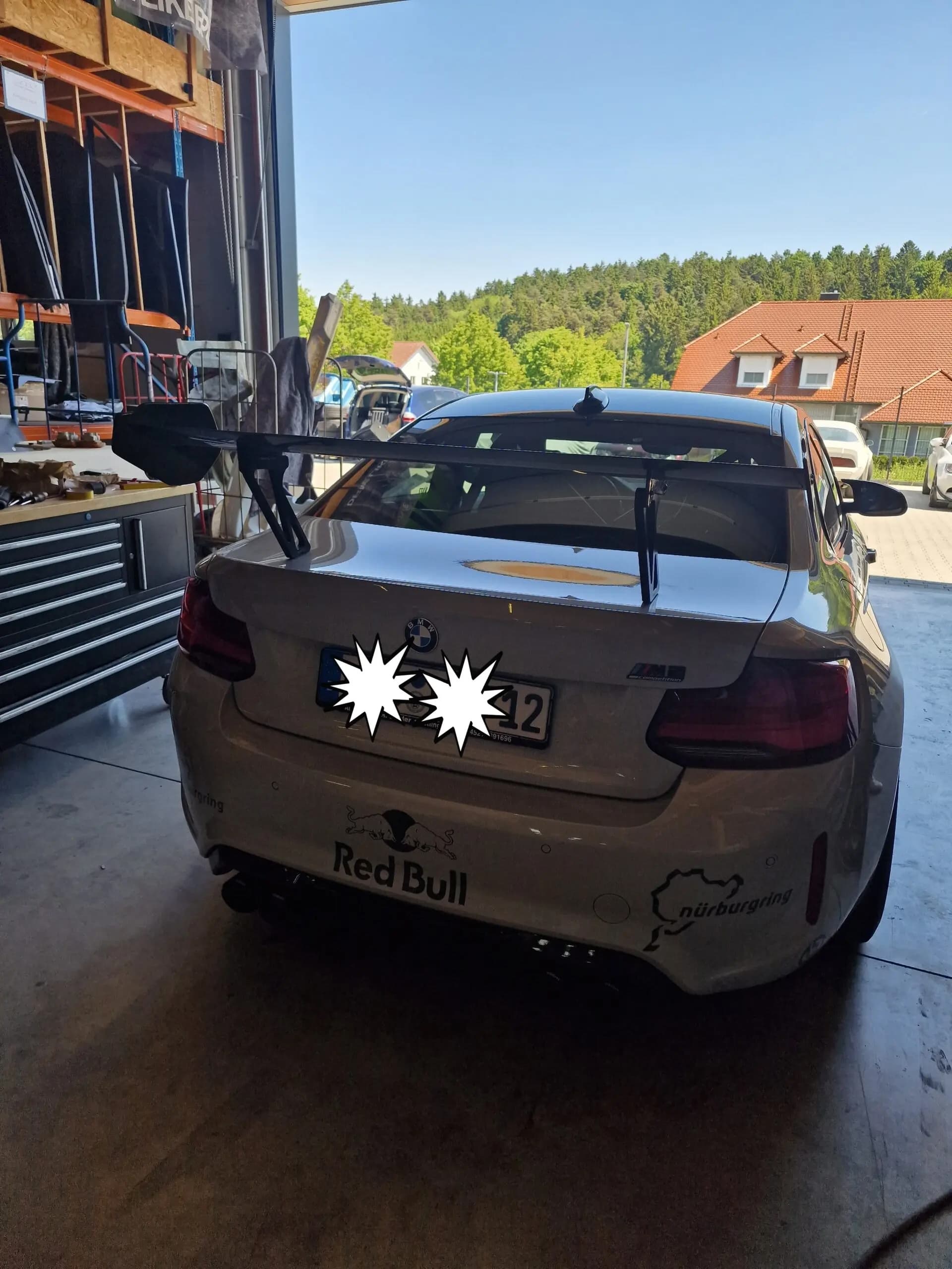 Heckansicht BMW M Coupé mit großem EM Cup Heckflügel und Carbon-Endplatten