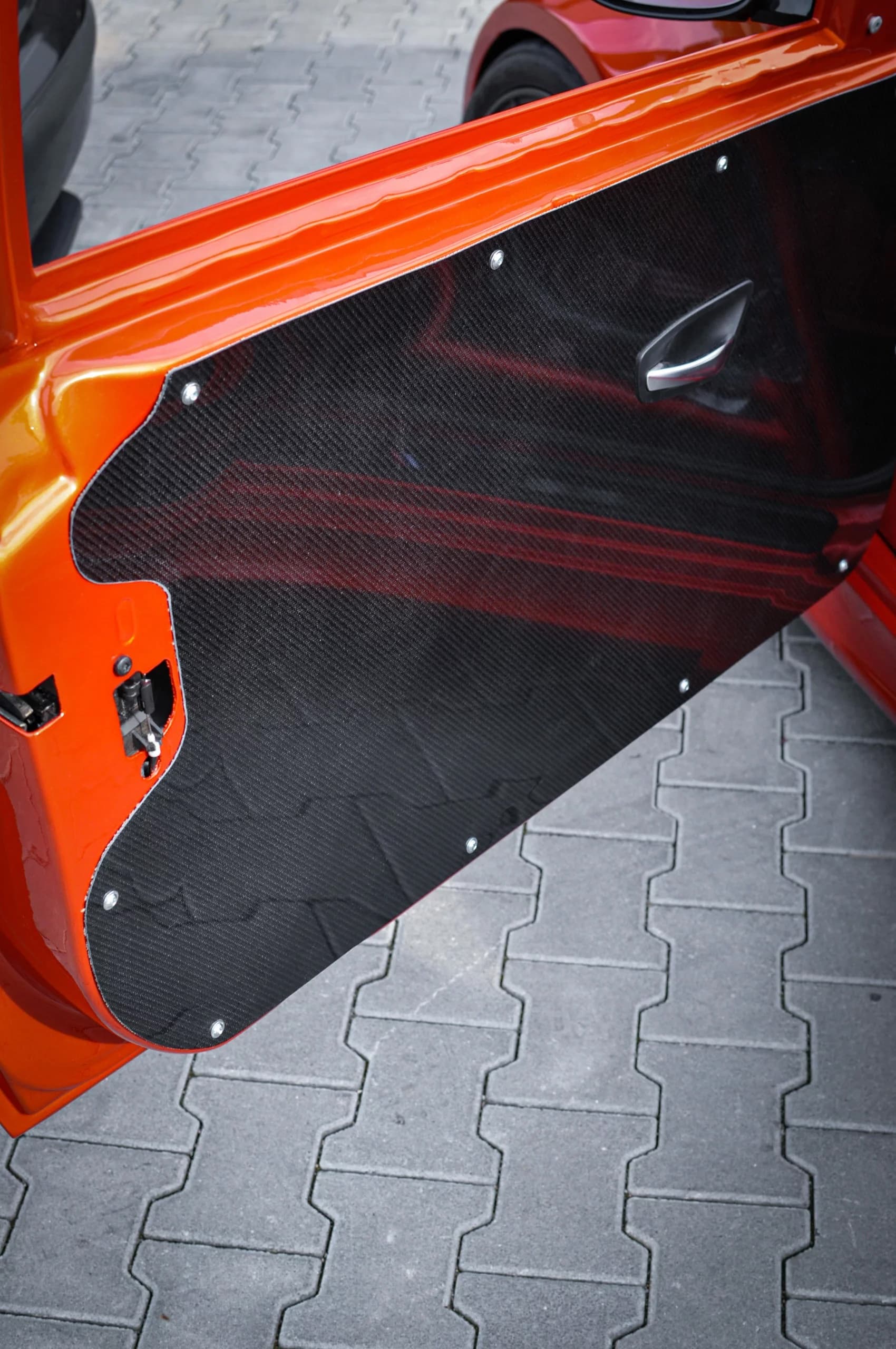 Carbon-Türverkleidung BMW E82 1er M, montiert, komplette Innenfläche